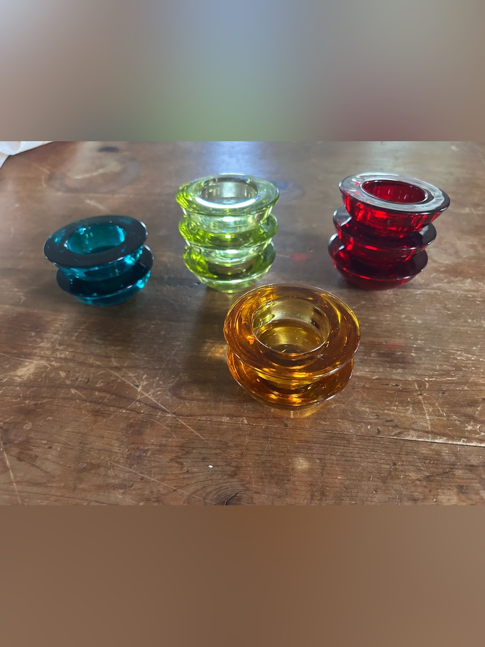 Set of ten Crate & Barrel assorted colors glass tealight holders.